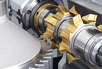 Gear cutting and chamfering parallel to machining